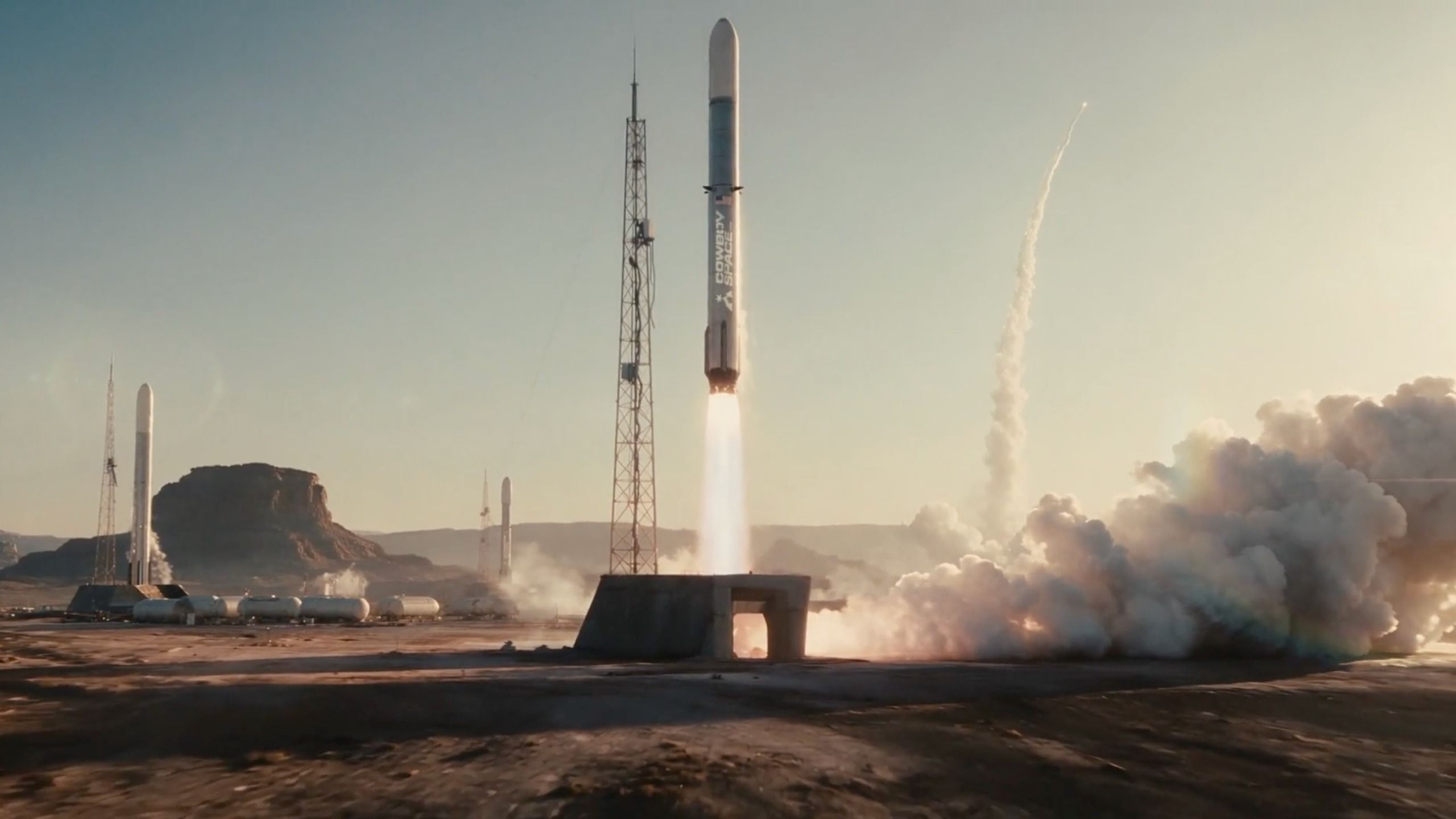 illustration of a big white rocket launching from a desert landscape