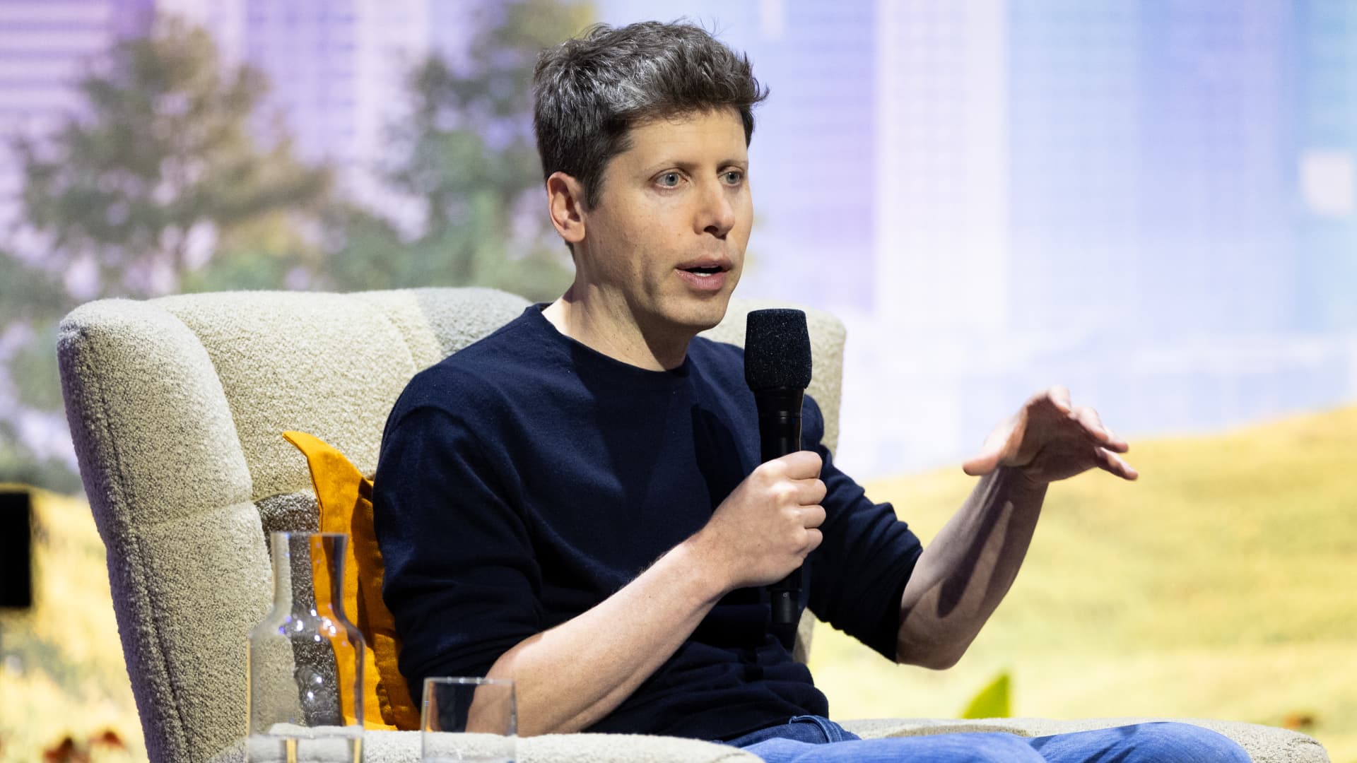 OpenAI CEO Sam Altman sits for a conversation with Salesforce CEO Marc Benioff at Salesforce's Dreamforce conference at the Moscone Center on Sept. 15